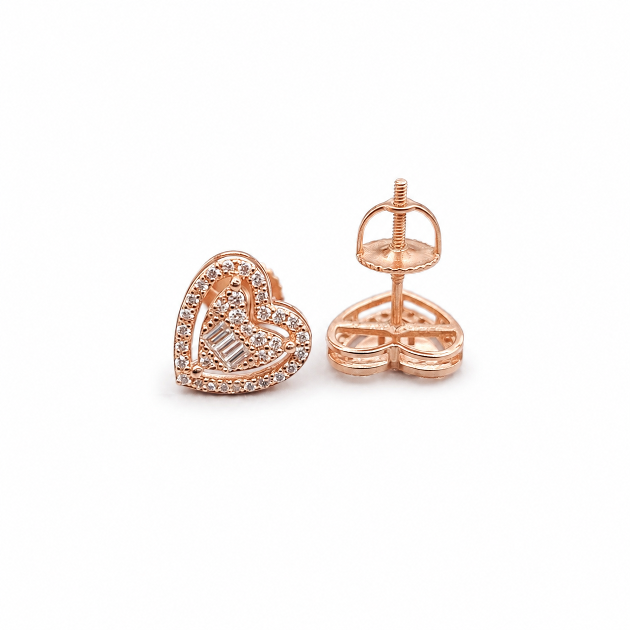 Double heart stud earrings on clean white background – detail view