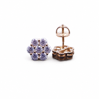 Rose gold moissanite flower cluster stud earrings on clean white background