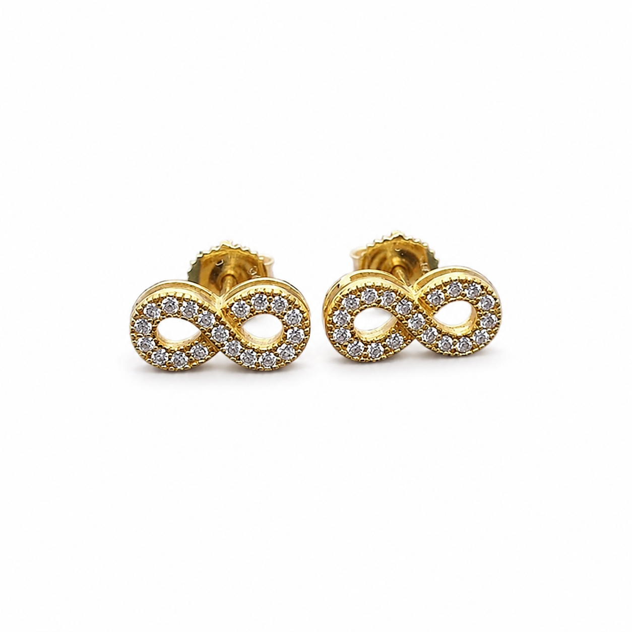Gold moissanite infinity stud earrings on clean white background